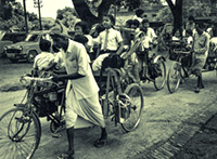 Schoolgirls in a rickshaw in Varanasi, India, photograph from the book 'BANARAS, City of God, Heart of India' 